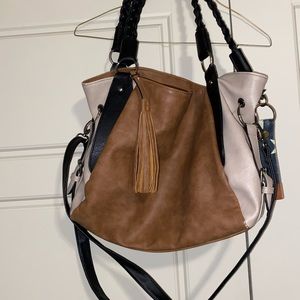 Brown, tan and black purse with cute details